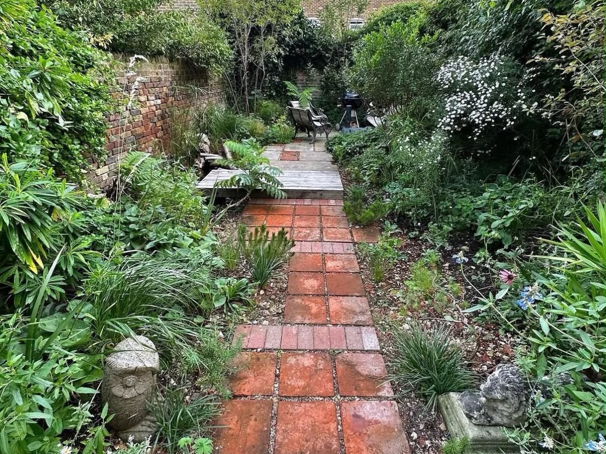 Original terracotta tiles reassembled into a garden path
