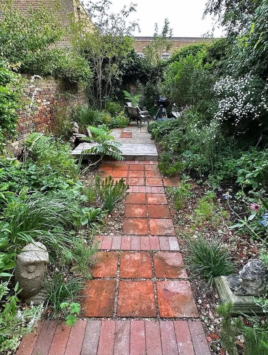 Original terracotta tiles reassembled into a garden path
