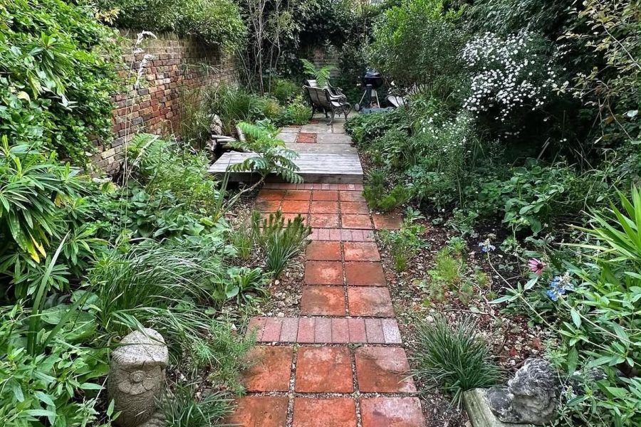 Original terracotta tiles reassembled into a garden path